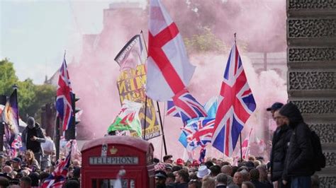Thousands march on London streets in anti-immigration protests. Pics