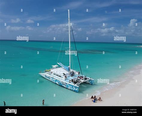 The aerial view of a yacht and people at the Turks and Caicos island's ...