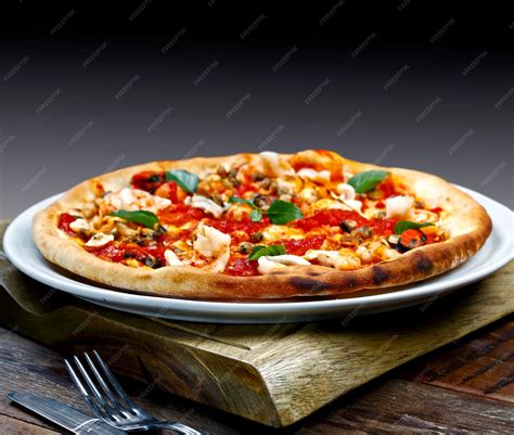 Premium Photo | Seafood pizza with shrimp squid shellfish