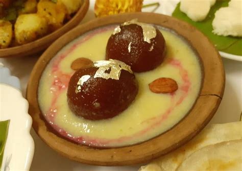 Gulabjamun in pineapple and rose rabri Recipe by Chandu Pugalia - Cookpad