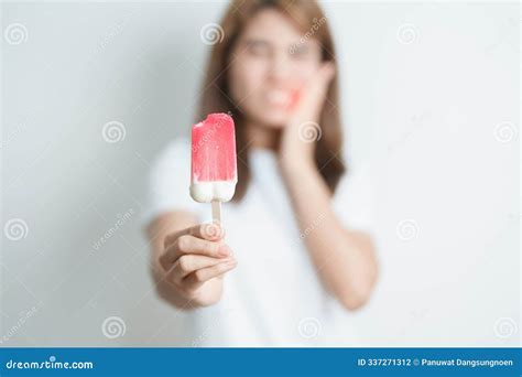 Teeth Sensitive To Cold Concept. Woman Hold Ice Cream and Having ...