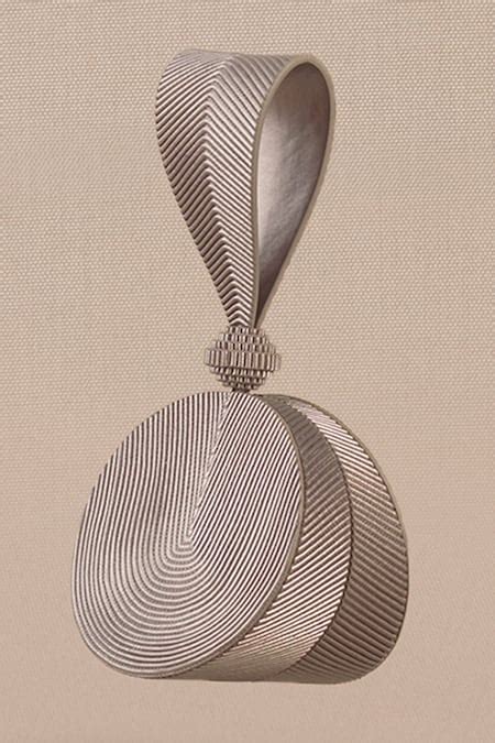 Buy Silver Reeza Circular Structured Metallic Wristlet by Ampm Online ...