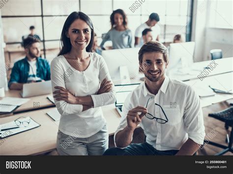 Business People Smiling Stock Photo 的图像结果