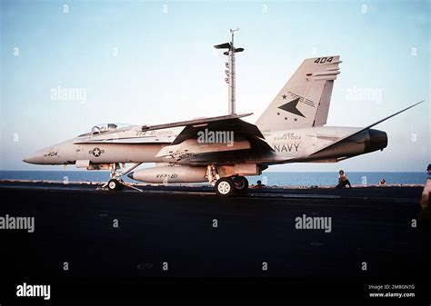 The pilot of a Strike Fighter Squadron 81 (VFA-81) F/A-18C Hornet ...