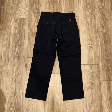 Dickie Cargo Pants small rip on right leg size 30x30 - Depop