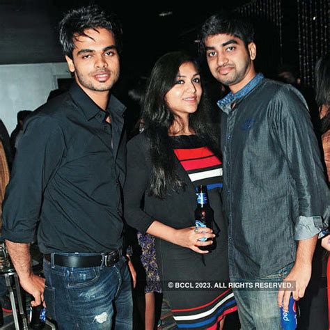Deepak, Sreeleena and Unni during a party in the city.