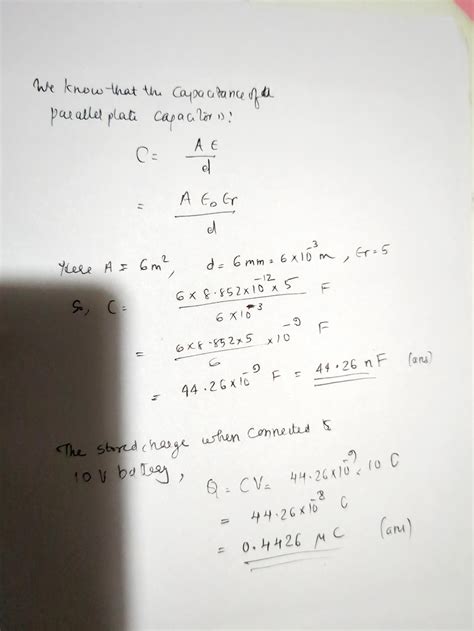 3. A parallel plate capacitor filled with mica having εr = 5 is ...