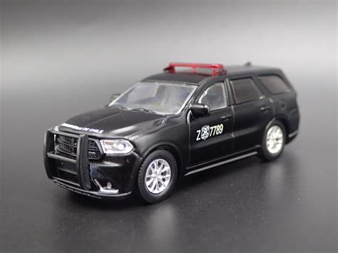 2018 18 DODGE DURANGO POLICE CARABINEROS DE CHILE 1:64 SCALE DIECAST M – Burning Rubber Toy Company