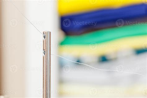 Image result for How to Use Large Thread Spool On Machine