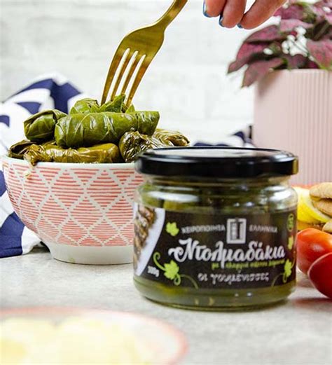 Dolmadakia (Greek stuffed grape leaves) with light lemon sauce-Oi ...