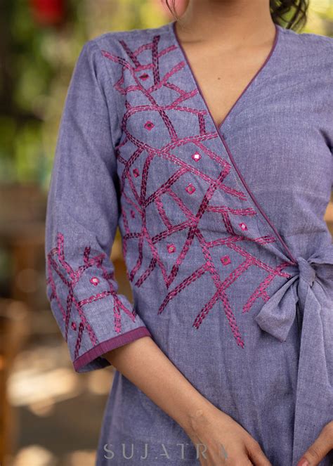 Elegant lilac cotton overlap dress highlighted with contrast embroider ...