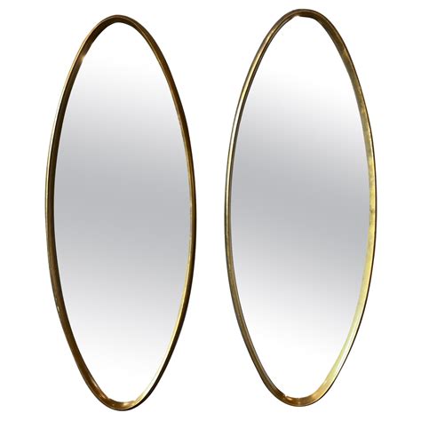 Pair of Gilt Oval Mirrors For Sale at 1stDibs