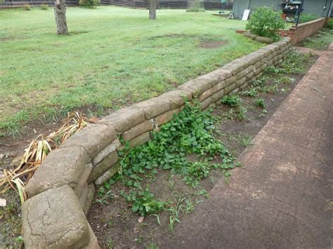 Concrete bags for a retaining wall. | Landscaping with rocks, Concrete ...