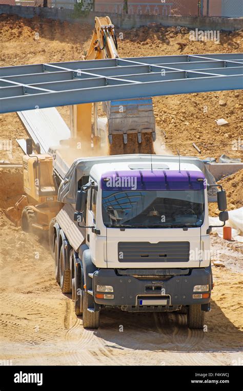 Image result for Large Excavators Loading Trucks