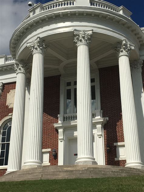 This is an example of a portico. A portico a porch that directs someone ...