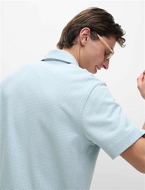 Buy Cotton Rich Seersucker Polo Shirt at Marks & Spencer