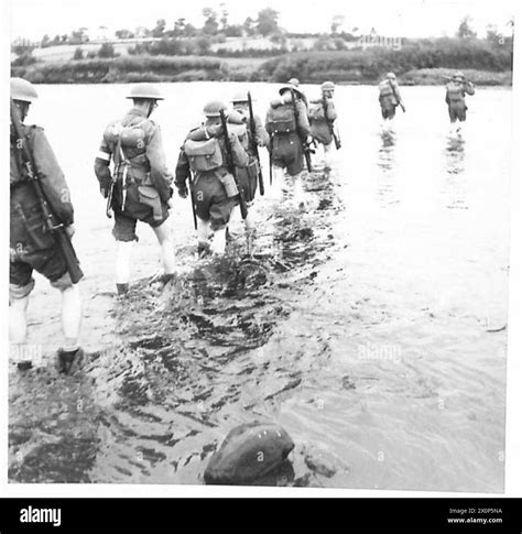 Troops ford a river in Northern Ireland during a military exercise Stock Photo - Alamy