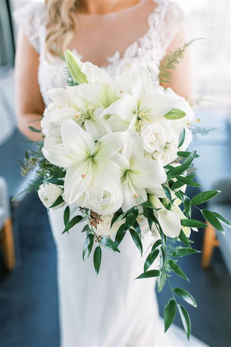 Lily Bouquet | Lily bouquet wedding, Flower bouquet wedding, White lily ...
