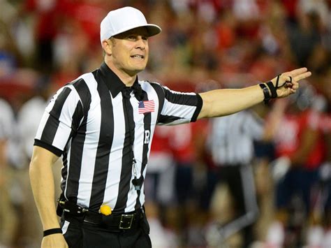 Football Referee Signals Touchdown