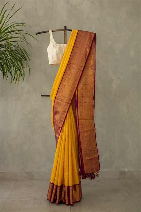 Yellow with Purple Yazhi and Peacock Motif Border Kanjivaram Silk Sare ...