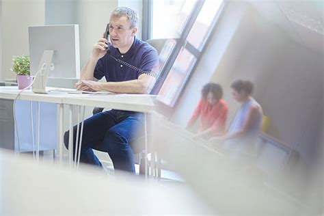 Photo of Business Owner Calling Someone 的图像结果