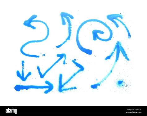 Different arrows made with light blue spray paint isolated on white ...