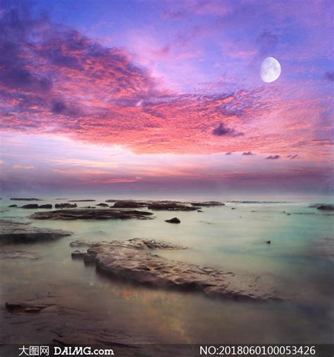 海边黄昏下的礁石美景摄影图片_大图网图片素材