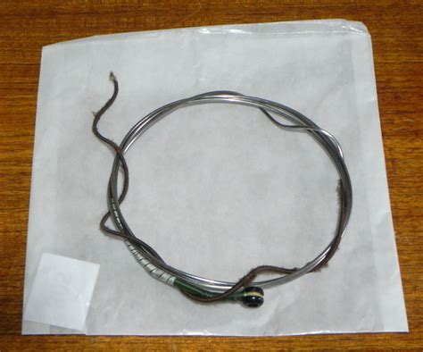 PRICE DROP !! >> TWO PIRASTRO OLIV DOUBLE BASS STRINGS (3/4) >> D and G ...