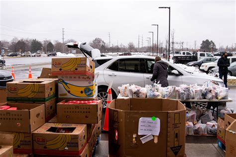 Flint area families receive food during giveaway hosted by United Way ...