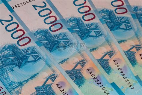 橙色背景上的俄罗斯钱用俄语写的2000卢布高清图片下载-正版图片504448317-摄图网