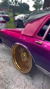 Candy purple Chevy box on gold 26’s