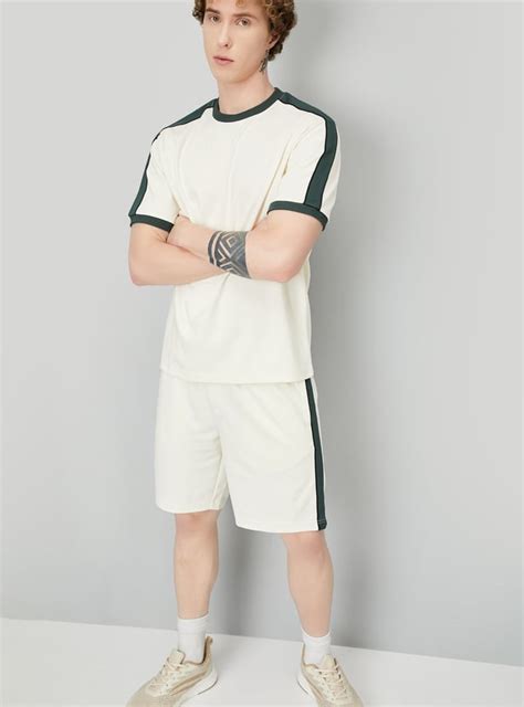 Buy Men Solid Side Taped T-shirt Online at just Rs. 699.0 ...