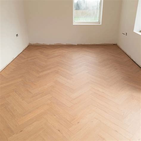 12mm Sunset Oak Herringbone AC5 Laminate Flooring