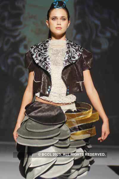 A model presents a creation by Sayantani Pal from the graduation batch ...