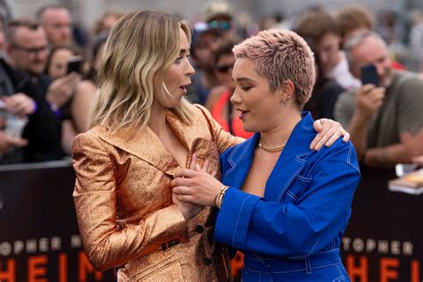Florence Pugh saves Emily Blunt from a wardrobe malfunction on 'Oppenheimer' red carpet