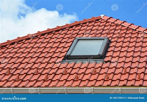 Skylight on Red Ceramic Roof Tiles House Roof. Modern Roof Skylight ...