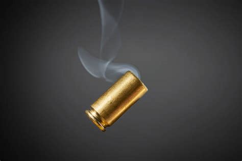 Image result for Bullet Shell Coming Out of a Gun