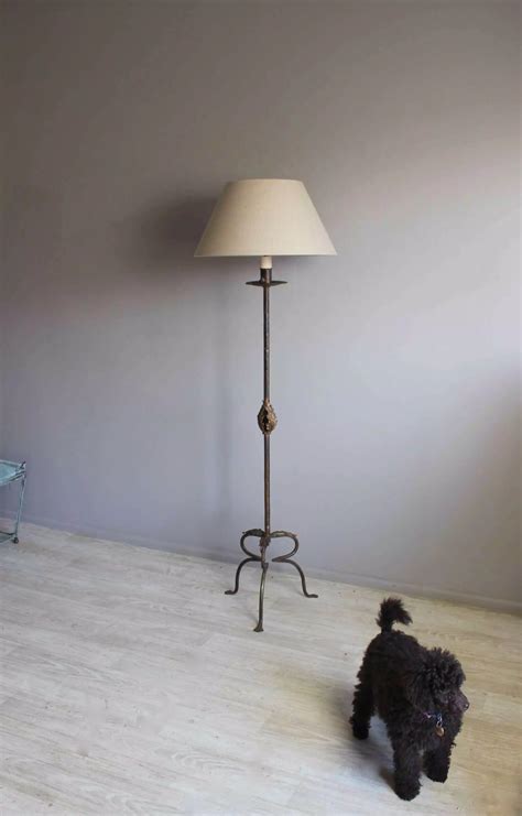 Elegant Spanish stick lamp with linen shade in Antique Floor Lamps
