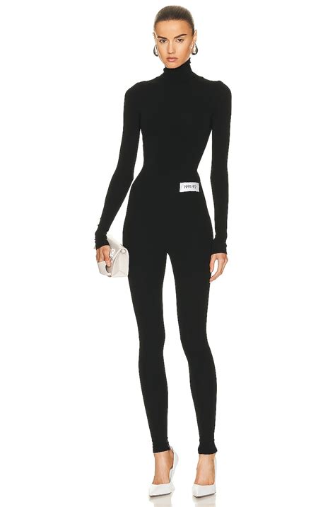 Dolce & Gabbana Turtleneck Long Sleeve Jumpsuit in Black | FWRD