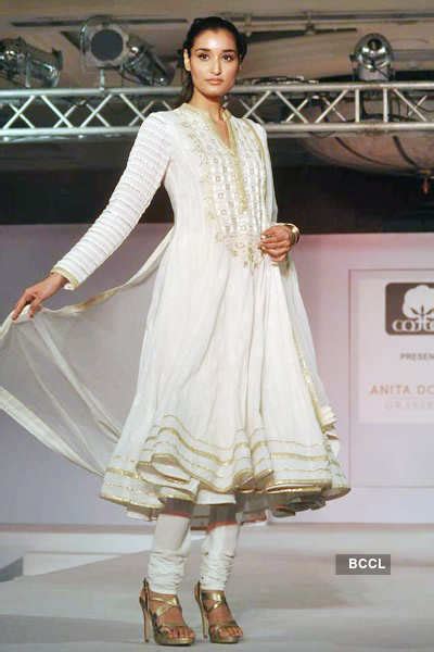 A model walks the ramp in designer Rina Dhaka's creation during Cotton ...