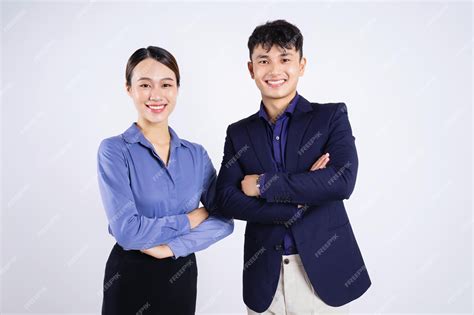 Photo of two young asian business people on white background | Premium ...