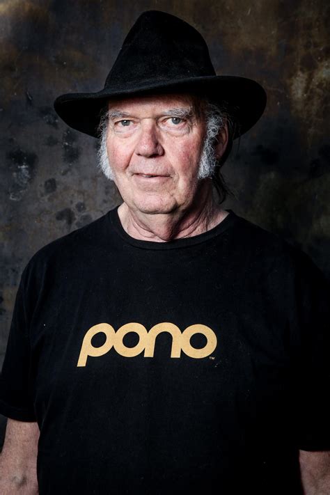 Neil Young plays Words and Love And Only Love from his home