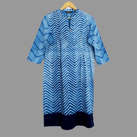 A beautiful & vibrant mid length kurta with a variable zig zag shibori ...