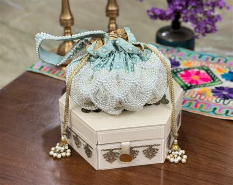 Pearl embellished clutch – Catchy Flairs