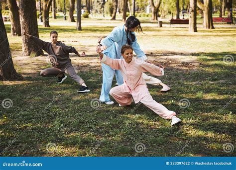 Martial Arts Instructor Putting Student Hands in Correct Position Stock Photo - Image of master ...