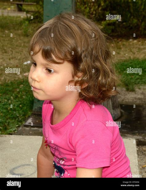 Four year old girl in pink dress Stock Photo - Alamy