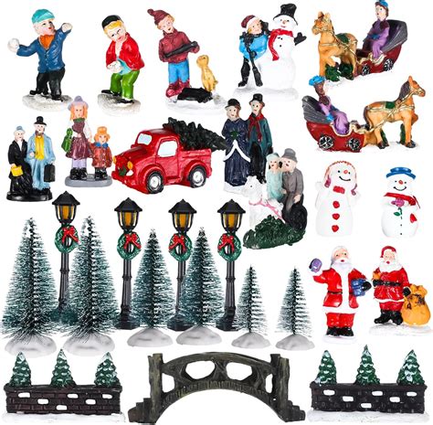 Amazon.com: Soaoo 24 Pieces Christmas Village Figurines Decoration Set ...