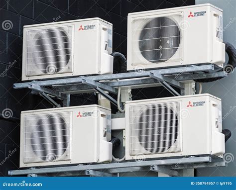 Mitsubishi Electric Air Conditioning Units Mounted at Dark Exterior ...