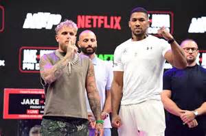 MIAMI, FLORIDA - DECEMBER 19: Anthony Joshua speaks at a press conference after Jake Paul v Anthony Joshua at Kaseya Center on December 19, 2025 in Miami, Florida. (Photo by Carmen Mandato/Getty Images for Netflix)