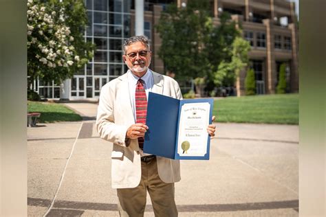 Fairmont State honors ties to Woodlawn Cemetery through volunteerism